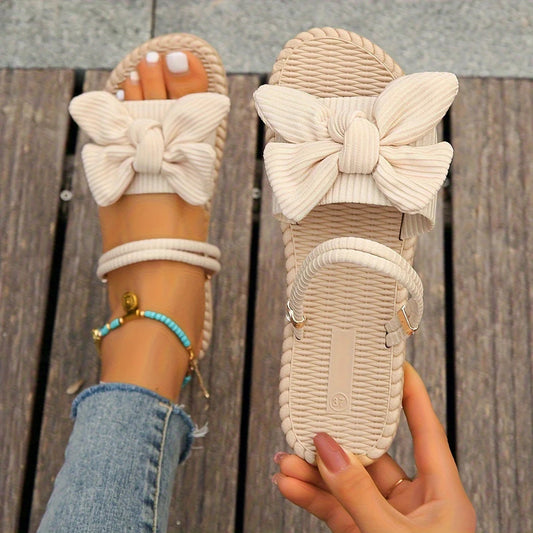 Pantuflas planas con lazo para mujer