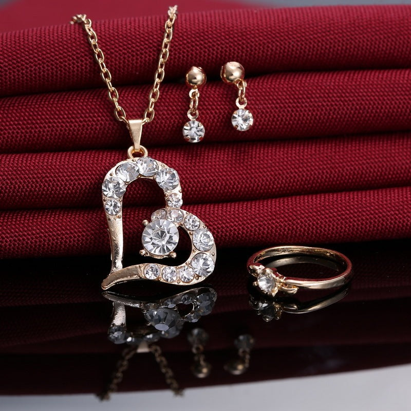 Conjunto de joyas con colgante de corazón y diamantes de imitación