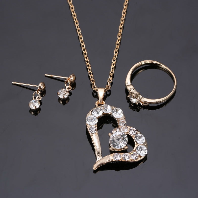 Conjunto de joyas con colgante de corazón y diamantes de imitación