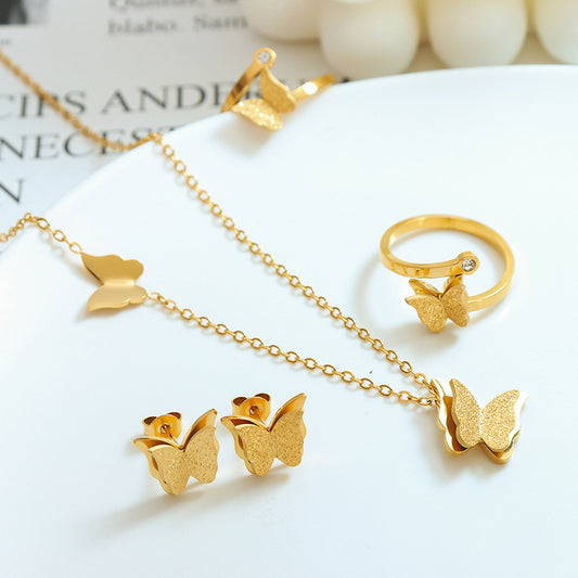 Collar, pendiente, anillo y adorno de acero de titanio con diseño de mariposa con textura esmerilada